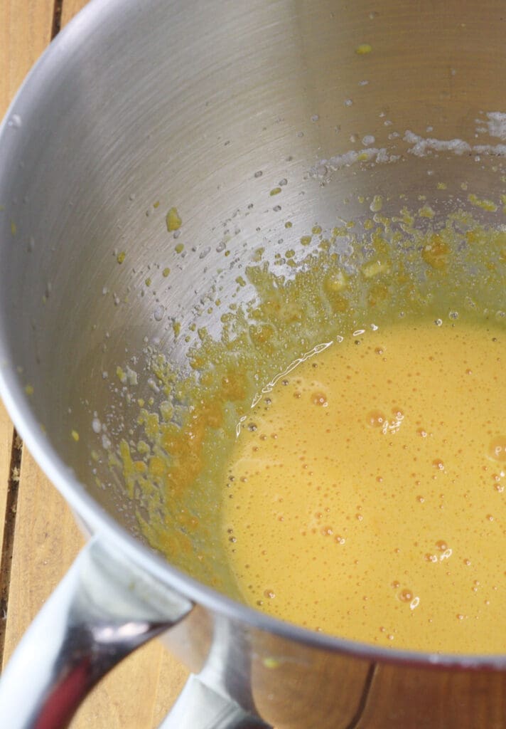 Egg yolks ready to be mixed with cottage cheese.